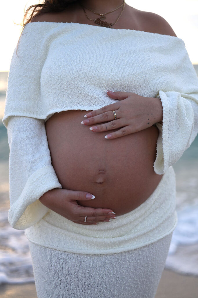 Photo of woman holding pregnant belly